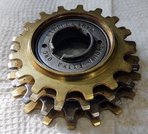 2. Begin by removing the sprockets. In this case the first three smallest are threaded together and then threaded onto the 4th sprocket, which is the first to thread to the Regina body.  