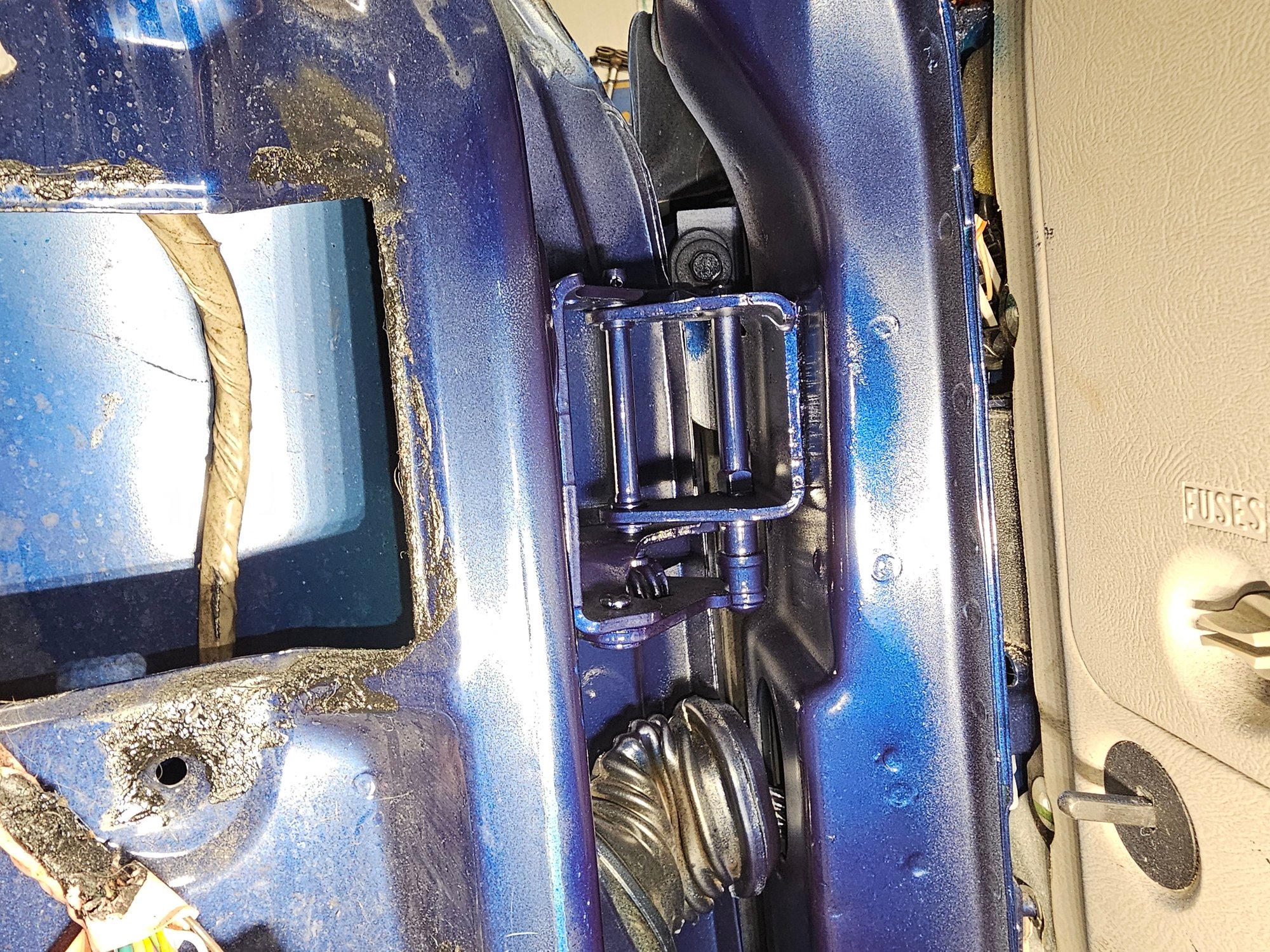 I know that I painted right over the roller, but it self clearances when you open it a few times and then just apply a coat of white lithium grease spray. 