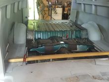 bolted to frame, sheet metal added to fit 54 panel truck