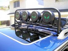 View from side. You must maintain about 1 1/2" spacing from lowest point on center bar, if you have a sunroof like I do, to allow for clearance when it is opened.