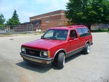 This is my 93 jimmy with a 327 large journal corvette motor that is .60 over with kb piston scat crank je rods afr alum heads and a whole lot more goodies:) It is lowered with torsion bar keys and drop blocks yes it is still 4wd and yes it still works makes for good launches lol