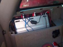 JL Audio 300/4 mounted in the Jack mount area w/ a PC fan wired in to keep it cool.