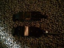 Kinda hard to see, but the top one is the broken upper fuel tank strap hanger and the bottom one is the new one