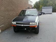 sitting out side the shop with the new front end