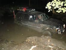 me stuck in the mud hole after a jeep screwd it up