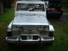 002 this is a phillipino owner jeep(jeepney) i bought this about three years ago as a rolling body/chassis, it had been on stage for eight years as a moving prop(miss siagon/grease) all parts had been removed, i have since located most of the parts and it runs and drives, it was built in the phillipines for an expat who had it built in rhd for his return to the uk. i hope to have it finished this summer. and yes most of it is stainless, this pic was taken just after i got it