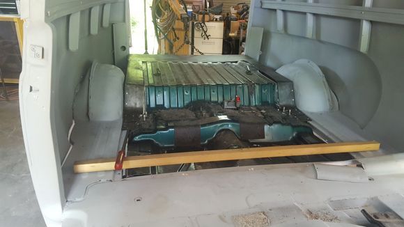 bolted to frame, sheet metal added to fit 54 panel truck