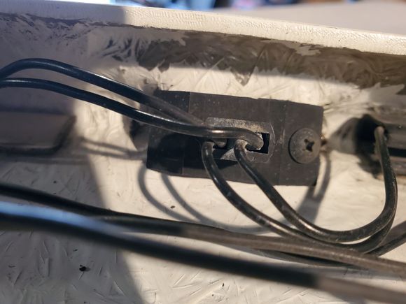 The bracket piece that holds the light in.