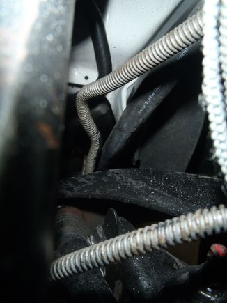 Front brake cable from the pedal through the frame.