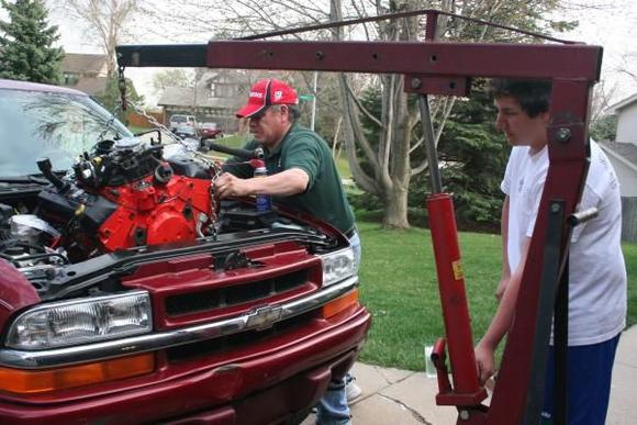 my dad and i puting the new engine in.
