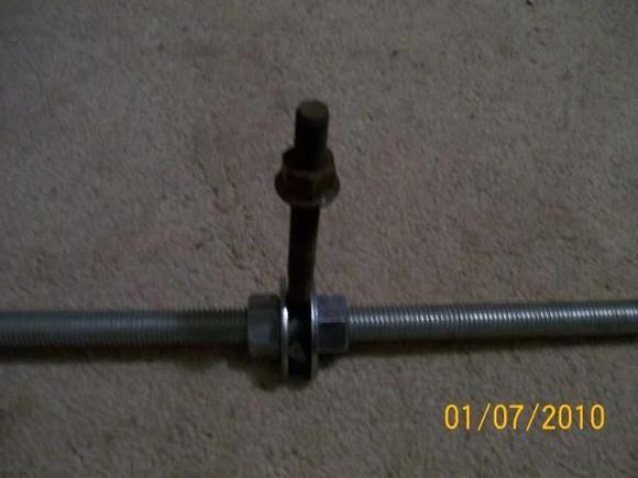 The threaded rod is nice because of the nuts and washers to hold the eye bolt in place, however, now I use a piece of steel pipe painted black because it's stronger.