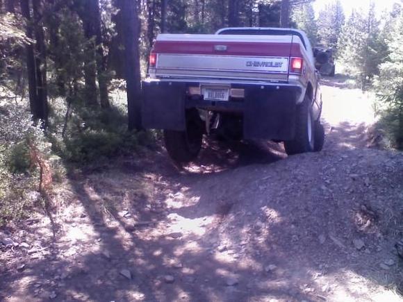 Kinda hard to tell, but my rear driver tire is about 18 inches off the ground. LOL.