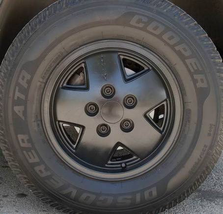 Black rims (after I painted them) with Cooper Discoverer ATR 235/75R15XL (extra load) M S tire
