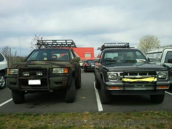 My S10 beside an awsome Isuzu with a rhino liner camo paint scheme going on.