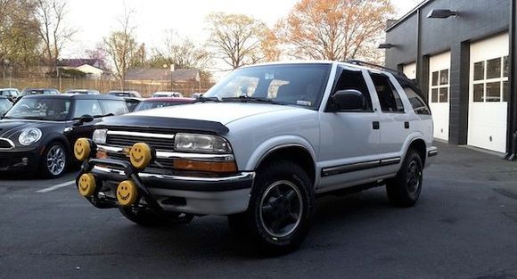 Front/Side View, Bull Bar, KC Lights, Painted Rims