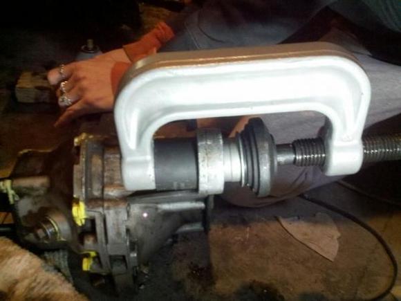 pressing new bushings into the junkyard differential.