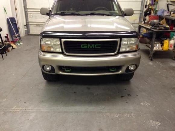 Painted front bumper, fog light inserts, and restored the headlights/ fog lights