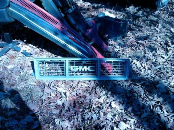 GMC Grill plan on cuttin out and puttin wire mesh in its place