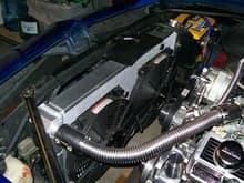 New radiator with 2 electirc fans controlled by independent manual switches on the dash.