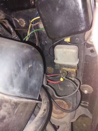 I have extra wiring as I added and AMP gauge in the circuit. The voltage regulator is above the horn relay and is used for the original 10DN alternator.