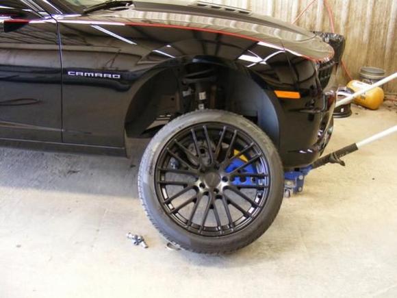 Replacing stock wheel's with brand new TSW style wheel's call "MAX" in flat black. I added red pin stripe to wheel edge next day.