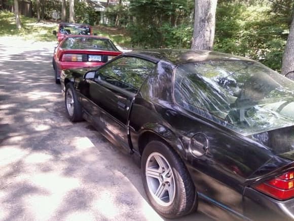 Like father, like son. My dad's red 5.0, my black 5.7