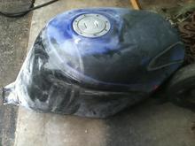 tank has a lot of paint that still needs to be taken off