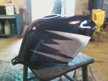 Gas tank freshly painted.