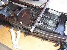 F4i subframe, battery tray, tail light, rear seat locking mechanism, rear passenger pegs.  Notice the "Frankenstein" bolts &amp; front seat bolts temporarily in place.