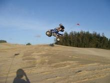 Me at winchester Bay Oregon having some fun
(04 yfz 450 with elka shocks and houser long travel a-arms and swing arm, 48 HP)