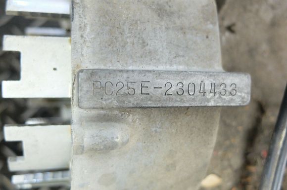 The tops of the 3's are curved, the bottom of the 5 is small relative to the top, and the zero has the breaks at the top and bottom