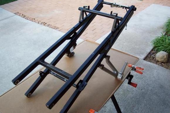 F4i split-seat subframe w/ passenger pegs &amp; rear keylock cable mechanism installed.