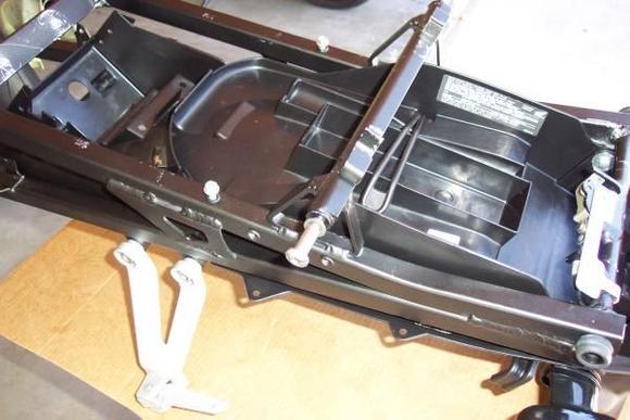 F4i subframe, battery tray, tail light, rear seat locking mechanism, rear passenger pegs.  Notice the "Frankenstein" bolts &amp; front seat bolts temporarily in place.