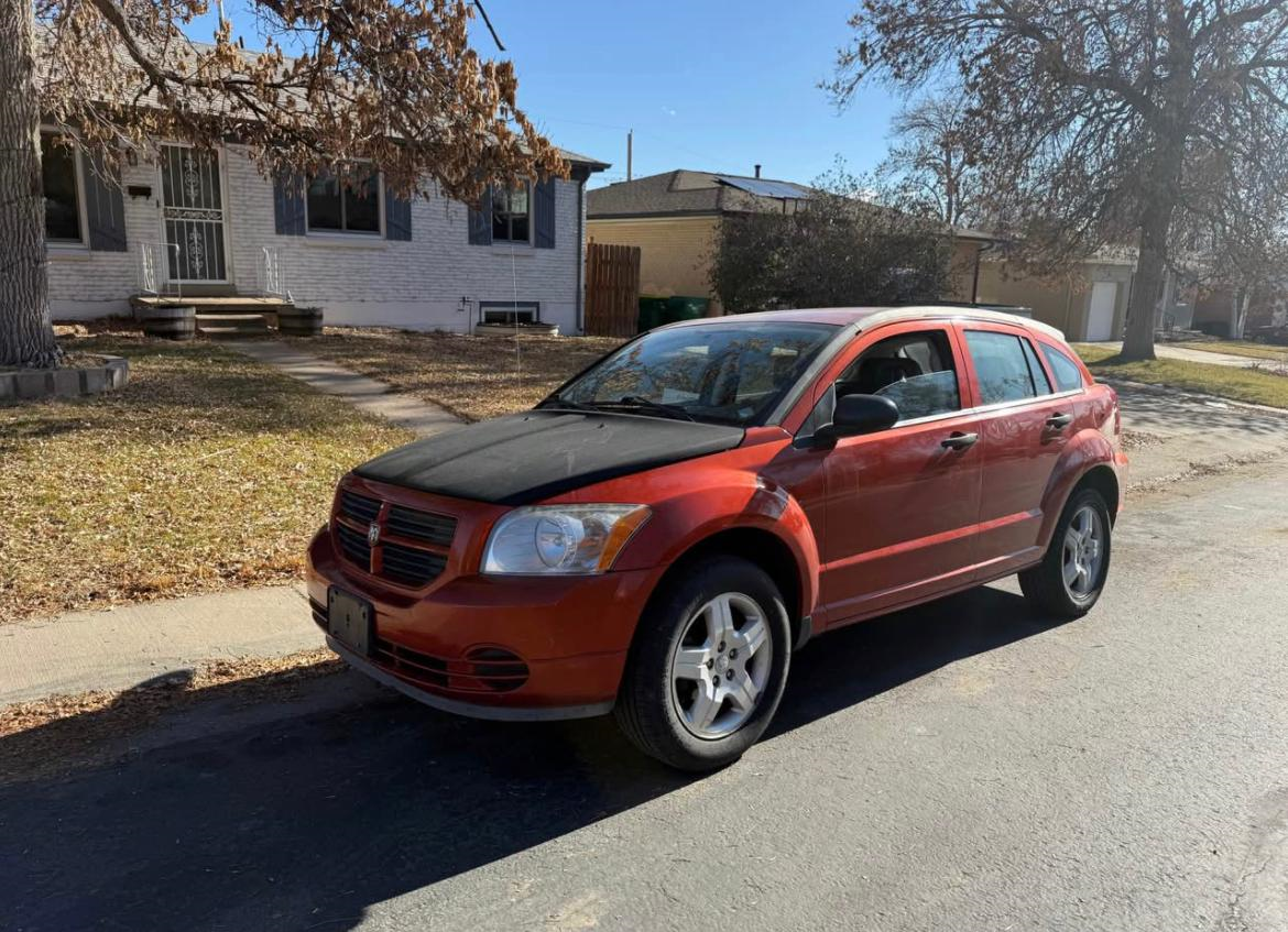 2008 Chevrolet Captiva Sport - 2008 Dodge Caliber · SE Sport Wagon 4D - Used - VIN 1B3HB28C58D747199 - 4 cyl - Manual - Red - Englewood, CO 80113, United States