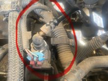 See broken hose - pls see next photo to reference location on the engine. 