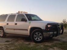 My suburban now has blacked out headlights brush guard and roof lights tell me what you think