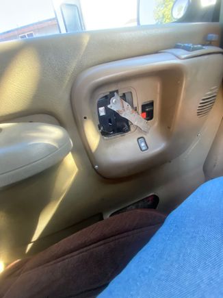 My driver side door panel is barely hanging on