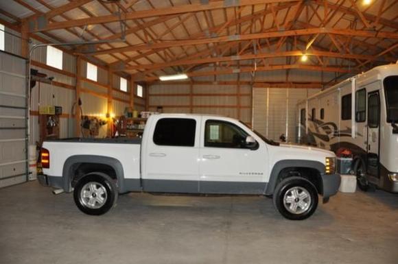 Second day home after negotiated upgrades applied. Front End Leveling Kit, Bushwacker Extenda-Fenders, rear wheel-well inserts, and Grey-Spary  all around.