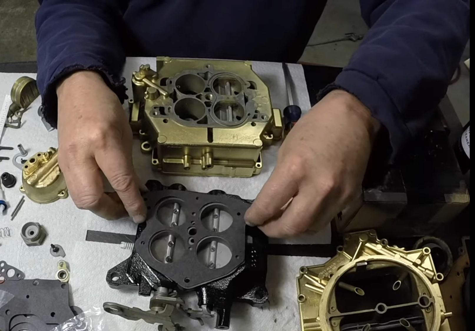 This is from another video. This carb is closer to what I have except he has the round shape float and I�ve got the rectangle shaped float
