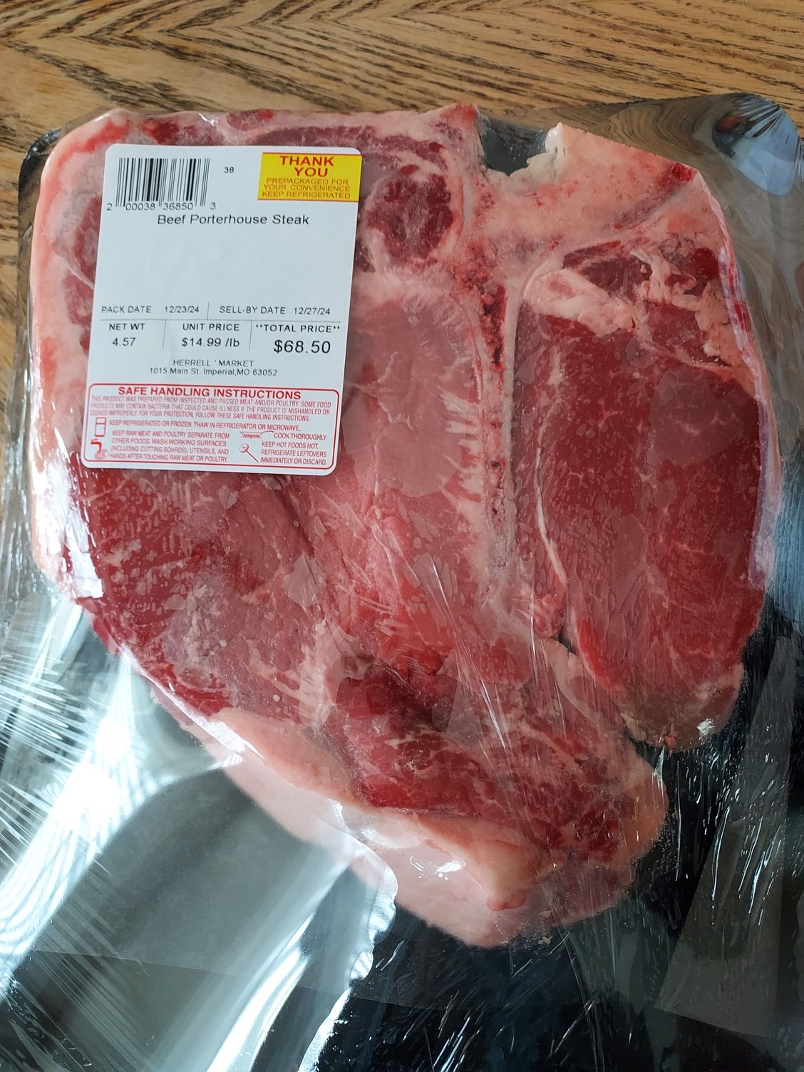 Since it's just Momma and I on Christmas Day, I asked her if she would like to have some nice Steaks for Christmas dinner and she said yes.  There is a local Meat Market near us that is famous for their high quality meats.  It's been open since 1904, still owned and operated by the same family.  I went there today and had a couple of Porterhouses custom cut, 1&1/2-inch thick and 2&1/4 lbs. each.  Merry Chriistmas to us!  