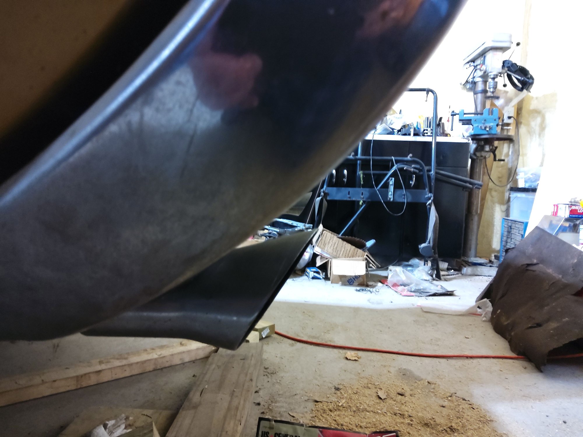 Driver's side, Passenger side sets out a little bit more and not sure why.  