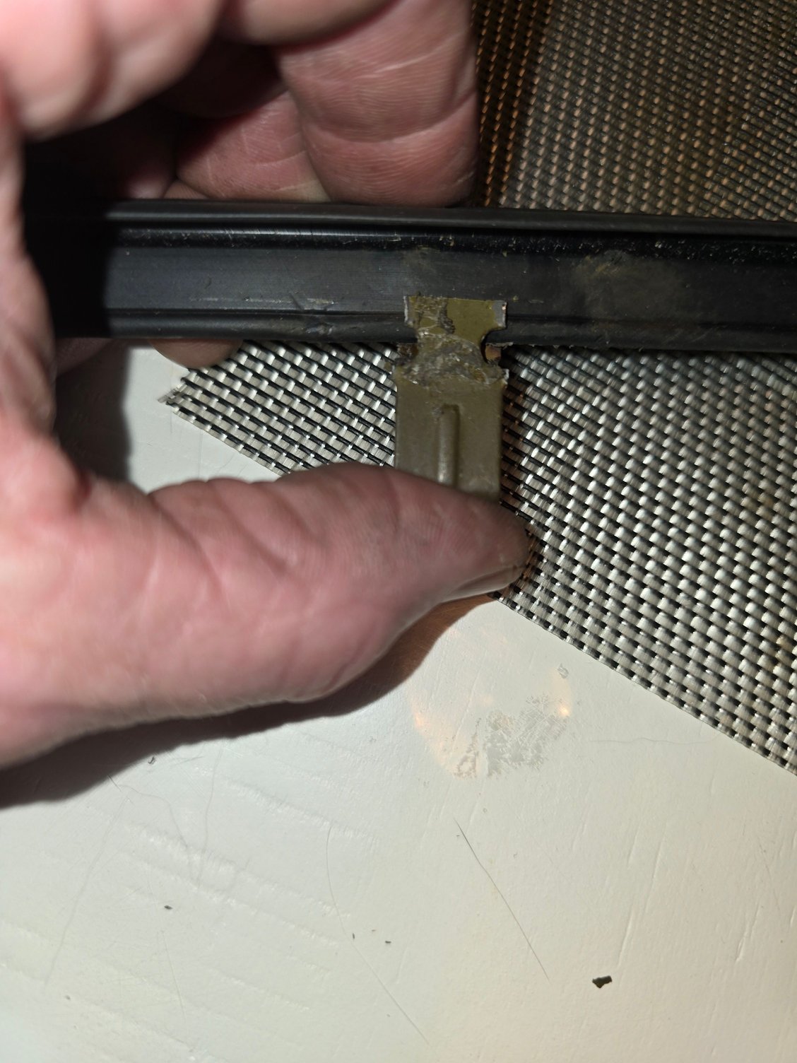 Next, I'll put the clip on the trim piece