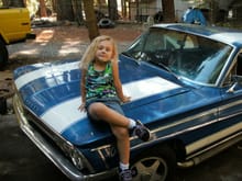 Grand Daughter posing with HER Cutlass