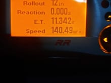 1/4 mile on brand new 295/50 street tires and just basic cement. This is STILL being hampered by severe traction issues during launch efforts. So so ET, but decent mile an hour on the big end. Need some slicks and a sticky track to really hook this thing up, but at least I can get some readings now, as all it would do before is just blow the tires off well into 3rd gear skating all over the place. 