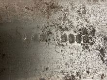 A number stamping on the metal base. Not sure what it means but I love finding hidden stampings! 