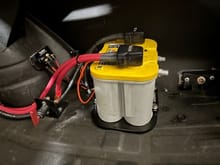 Trunk mounted battery with cutoff