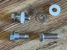 The longer bolts are not really longer, they're just threaded all the way to the end of the bolt.  Using a stainless washer and turning the bushing around will capture the floating bow, and the nylon spacer will push the bow 1/4" outward.  The 