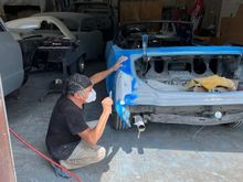 The rear quarters were repaired with quarter panel skins; here Luis is fitting the quarter caps to the skins as there were some irregular gaps. 