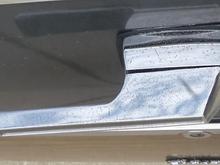 Pinprick damage on tailgate handle