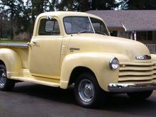 The wife's 51 Chevy truck.  She rescued it from a farmers field in 1979 for $100 when she was 14.  Her and her Dad restored it and she drove it through high school.  We completed the second restoration in 2008 and changed it from red to Chevy Butternut Yellow.